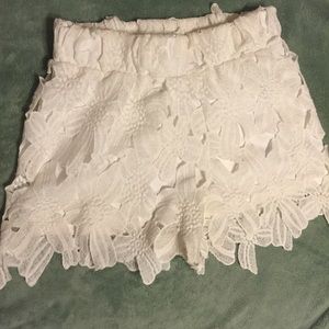 White lace shorts
