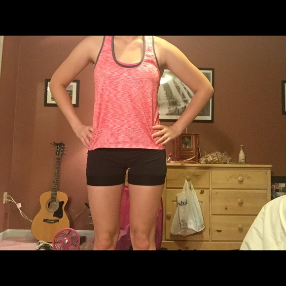Red, loose workout tank top, hardly ever worn!
