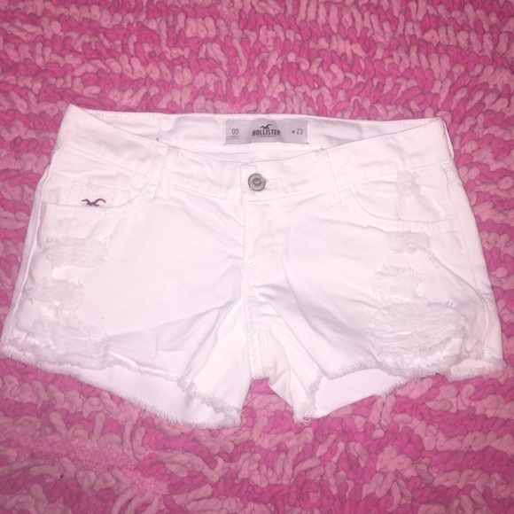 Hollister white Jean shorts with ripped frontside