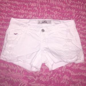 Hollister white Jean shorts with ripped frontside