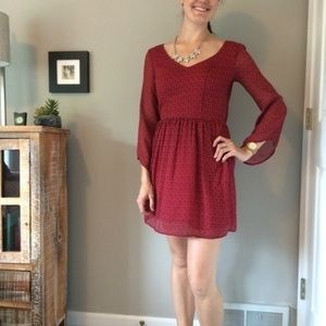 Red and black patterned chiffon open back dress