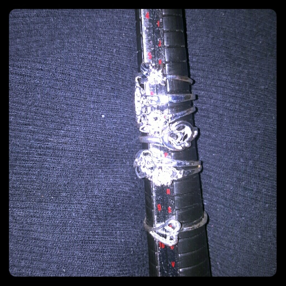7 silver plated rings, various sizes