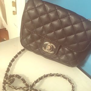 Black quilted cross body bag