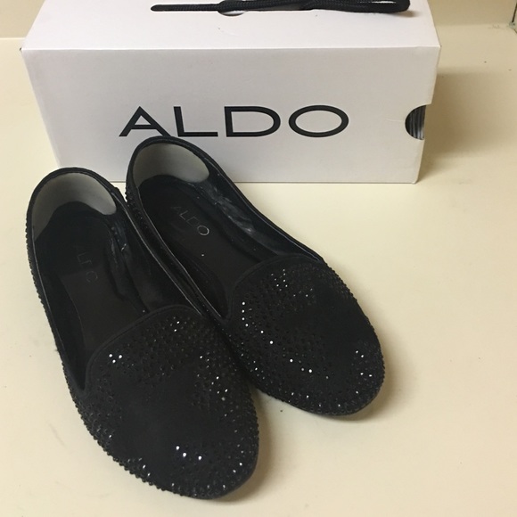 Black Aldo flats.