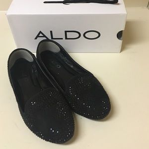 Black Aldo flats.