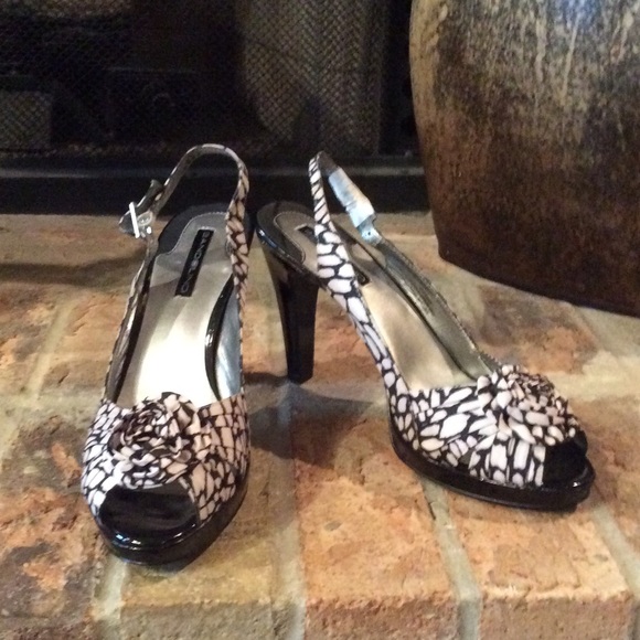 Heels never worn. Excellent condition