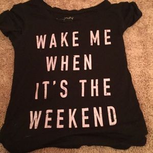 I am selling a black tee shirt with a cute phrase