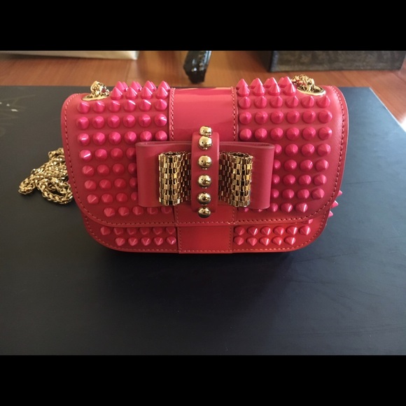 Christian Louboutin " sweet charity " clutch