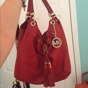 NWOT Michael Kors red bag with tassel