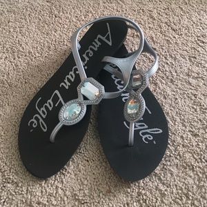 Black and grey sandals with rhinestones