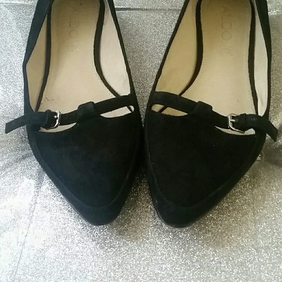 Black Aldo flats with buckles