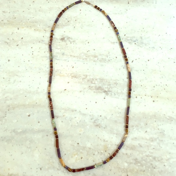 Genuine stone necklace.