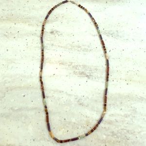 Genuine stone necklace.