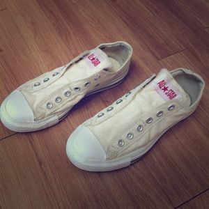 Converse.  White lace less.  Size 8