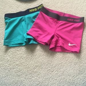 Two Nike Pros Size S