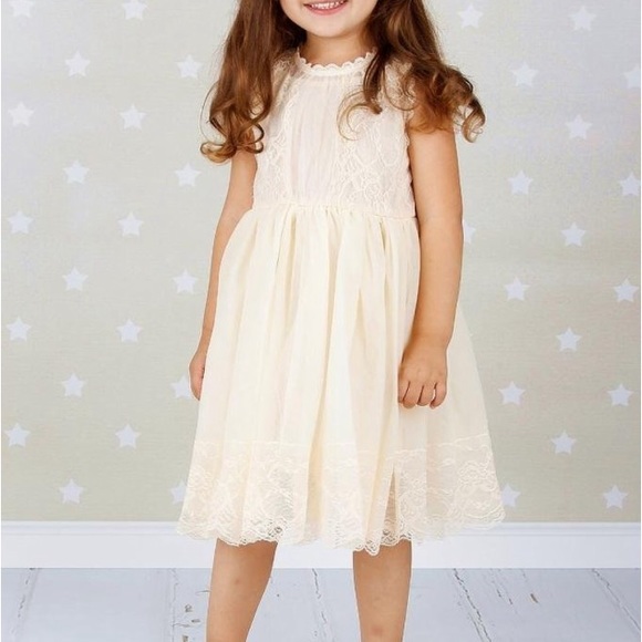 Whimsical little girls dress. Brand new in bag