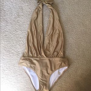 Low cut gold halter one piece!