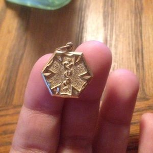 14 kt charm- Star of light Pendant