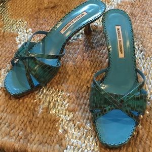 Show stopping blue lizard skin Manolo mules.