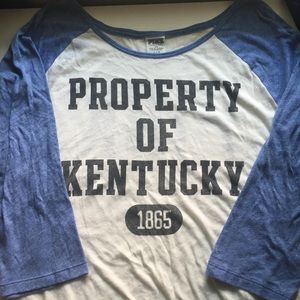 Pink University of Kentucky baseball tee.