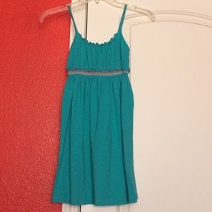 Young girl teal dress