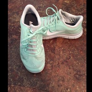 Custom mint green 3.0 Nike Free running shoes.