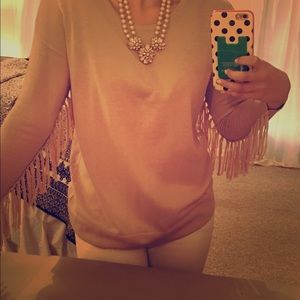 Awesome long sleeve tan fringe shirt!