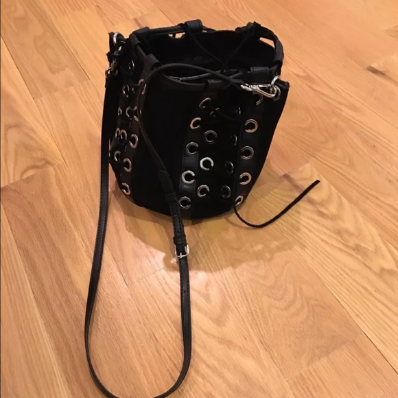 Suede bucket bag with grommets