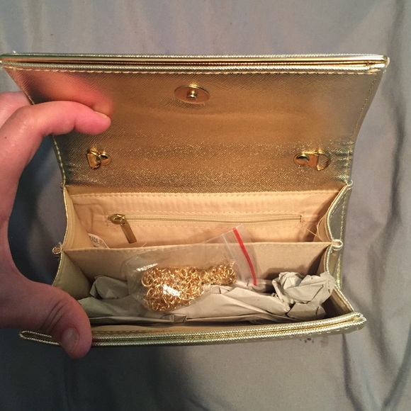 New never used gold clutch with chain strap - Picture 3 of 3