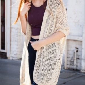 Fish net cardigan from Brandy Melville. Never worn