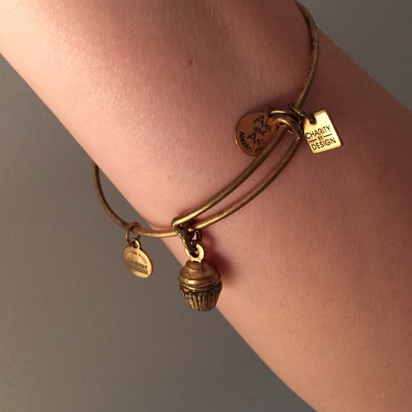 Gold Alex and Ani cupcake bracelet