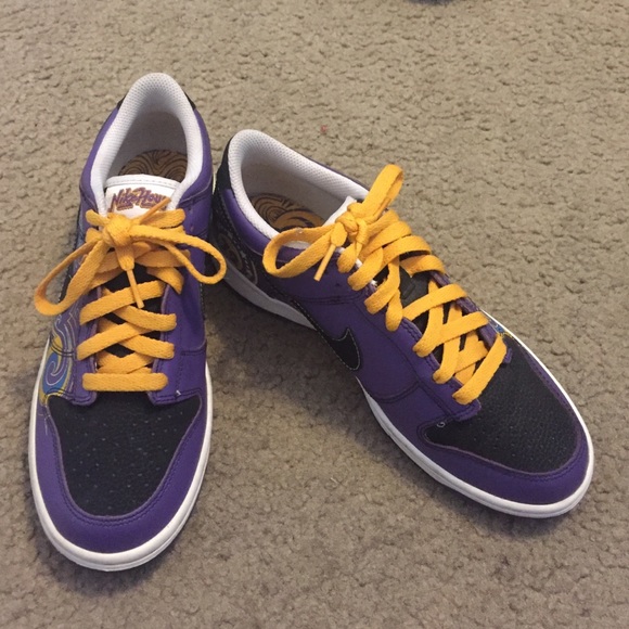 Purple and Gold Nike's. Great condition.