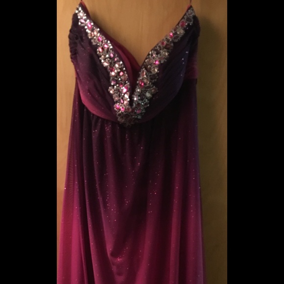 Full length pink and purplesleeveless prom dress.