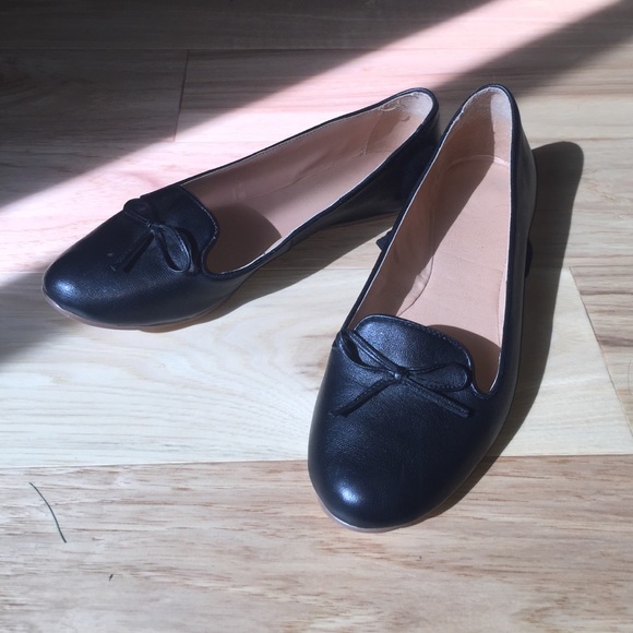 Black ballet style flats with bow