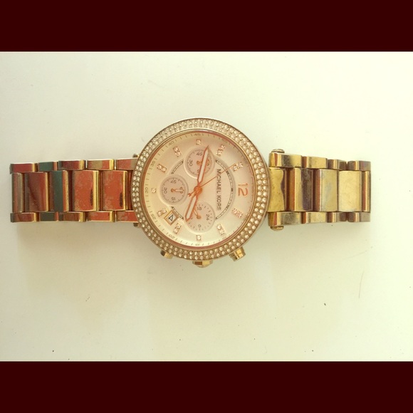 Gold MK watch