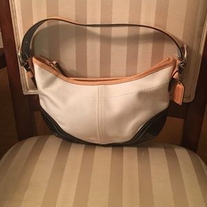 Authentic Coach peanut butter, cream and black bag