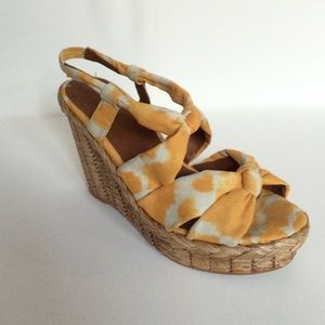 Yellow tiki wedge heels