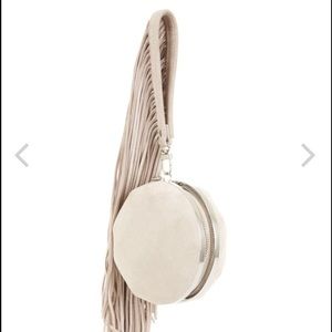 BCBG RUNWAY round fringe clutch