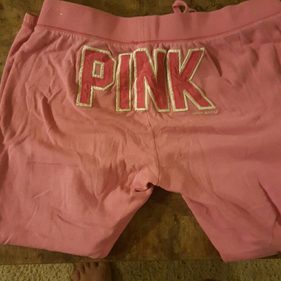Pink Victoria's secret sweat pants.