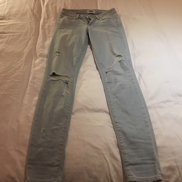 PAIGE: light wash slightly ripped jeans