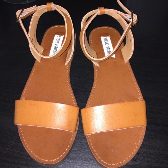 Brown sandals by Steve Madden