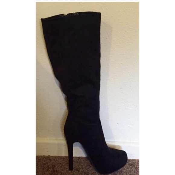 Black suede boots with gold zippers
