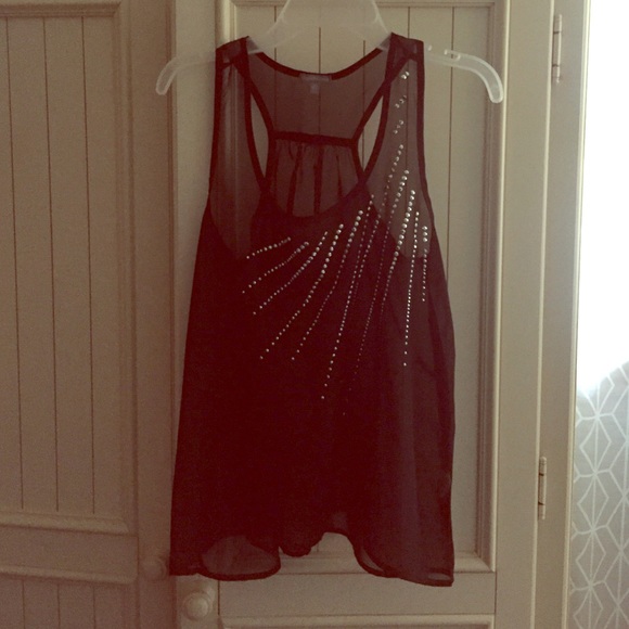 Black tank top with sequins. Worn once. Size xs.
