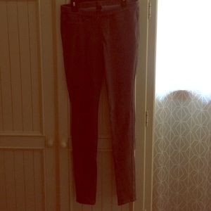 A pair of grey stretchy skinny jeans, never worn.