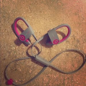 Wireless Beats by Dr. Dre. Hot pink and gray