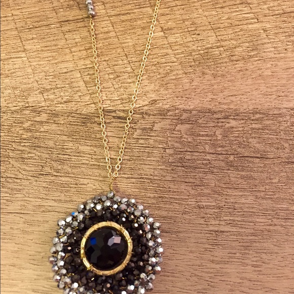 south moon under long necklace