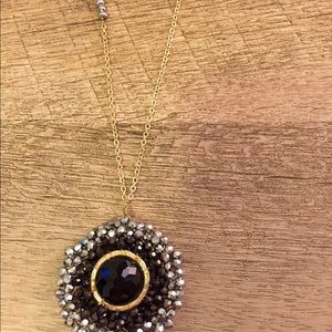 south moon under long necklace