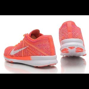 Orange Nike Flyknits