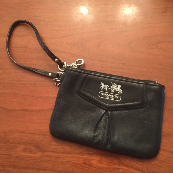 Real leather, black Coach small wristlet.