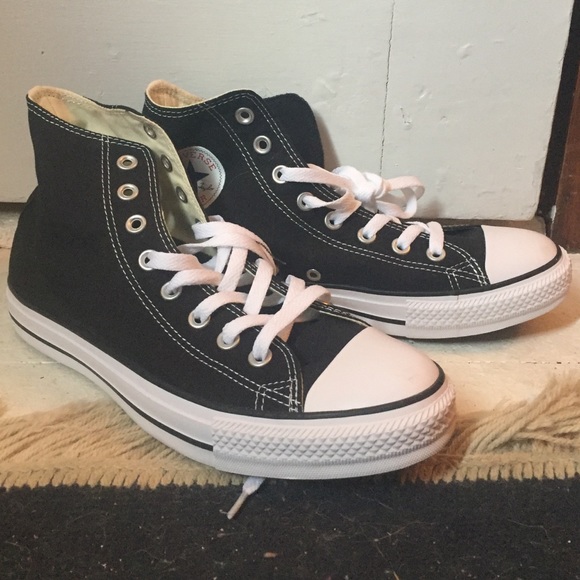 Black and white high top converse